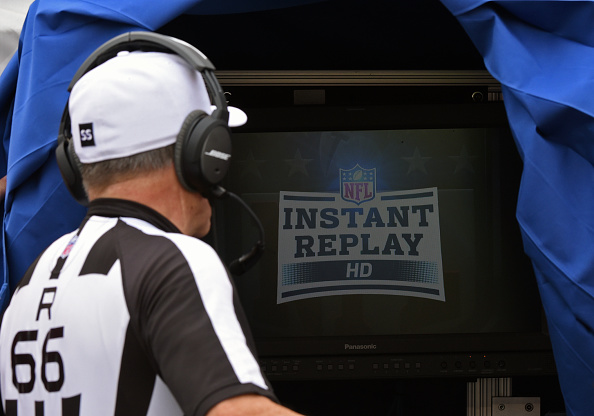 PITTSBURGH, PA - SEPTEMBER 28:  National Football League referee Walt Anderson #66 looks at the monitor in the instant replay booth used to review challenged plays during a game between the Tampa Bay Buccaneers and the Pittsburgh Steelers at Heinz Field on September 28, 2014 in Pittsburgh, Pennsylvania.  The Buccaneers defeated the Steelers 27-24.  (Photo by George Gojkovich/Getty Images)