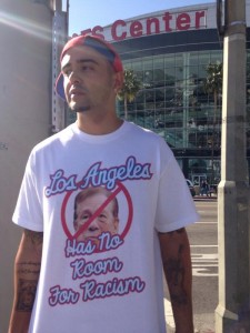 A fan wears a shirt protesting Donald Sterling and his comments before Game Five. Photo by Adam Hawk on April 29, 2014.