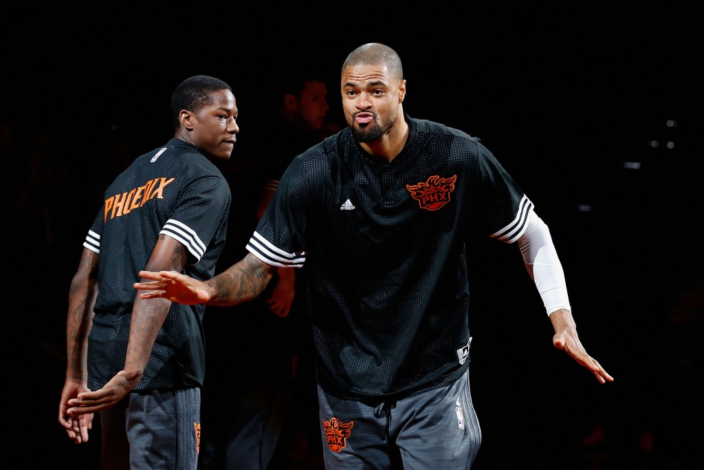 PHOENIX, AZ - OCTOBER 07:  Tyson Chandler #4 of the Phoenix Suns high fives teammates as he is introduced to the preseason NBA game against the Sacramento Kings at Talking Stick Resort Arena on October 7, 2015 in Phoenix, Arizona. NOTE TO USER: User expressly acknowledges and agrees that, by downloading and or using this photograph, User is consenting to the terms and conditions of the Getty Images License Agreement.  (Photo by Christian Petersen/Getty Images)