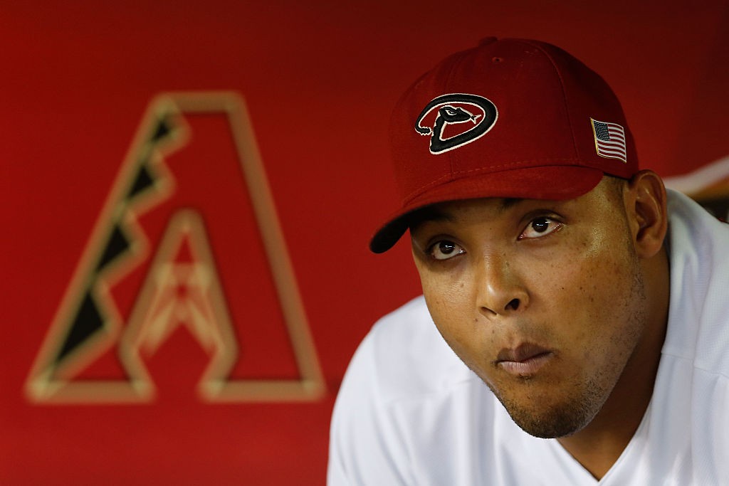 PHOENIX, AZ - SEPTEMBER 11: Yasmany Tomas #24 of the Arizona Diamondbacks sits in the dugout during the MLB game against the Los Angeles Dodgers at Chase Field on September 11, 2015 in Phoenix, Arizona. (Photo by Christian Petersen/Getty Images)