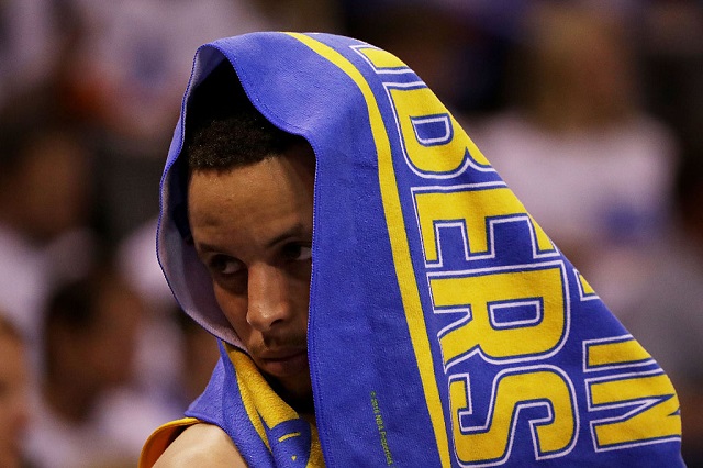 OKLAHOMA CITY, OK - MAY 22: Stephen Curry #30 of the Golden State Warriors covers his face in the fourth quarter against the Oklahoma City Thunder in game three of the Western Conference Finals during the 2016 NBA Playoffs at Chesapeake Energy Arena on May 22, 2016 in Oklahoma City, Oklahoma. (Photo by Ronald Martinez/Getty Images)