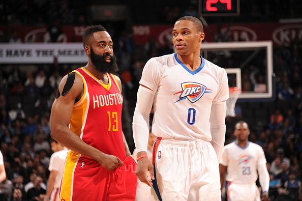 OKLAHOMA CITY, OK- APRIL 5: James Harden #13 of the Houston Rockets and Russell Westbrook #0 of the Oklahoma City Thunder walk off the court on April 5, 2015 at Chesapeake Energy Arena in Oklahoma City, Oklahoma. (Photo by Bill Baptist/NBAE via Getty Images)